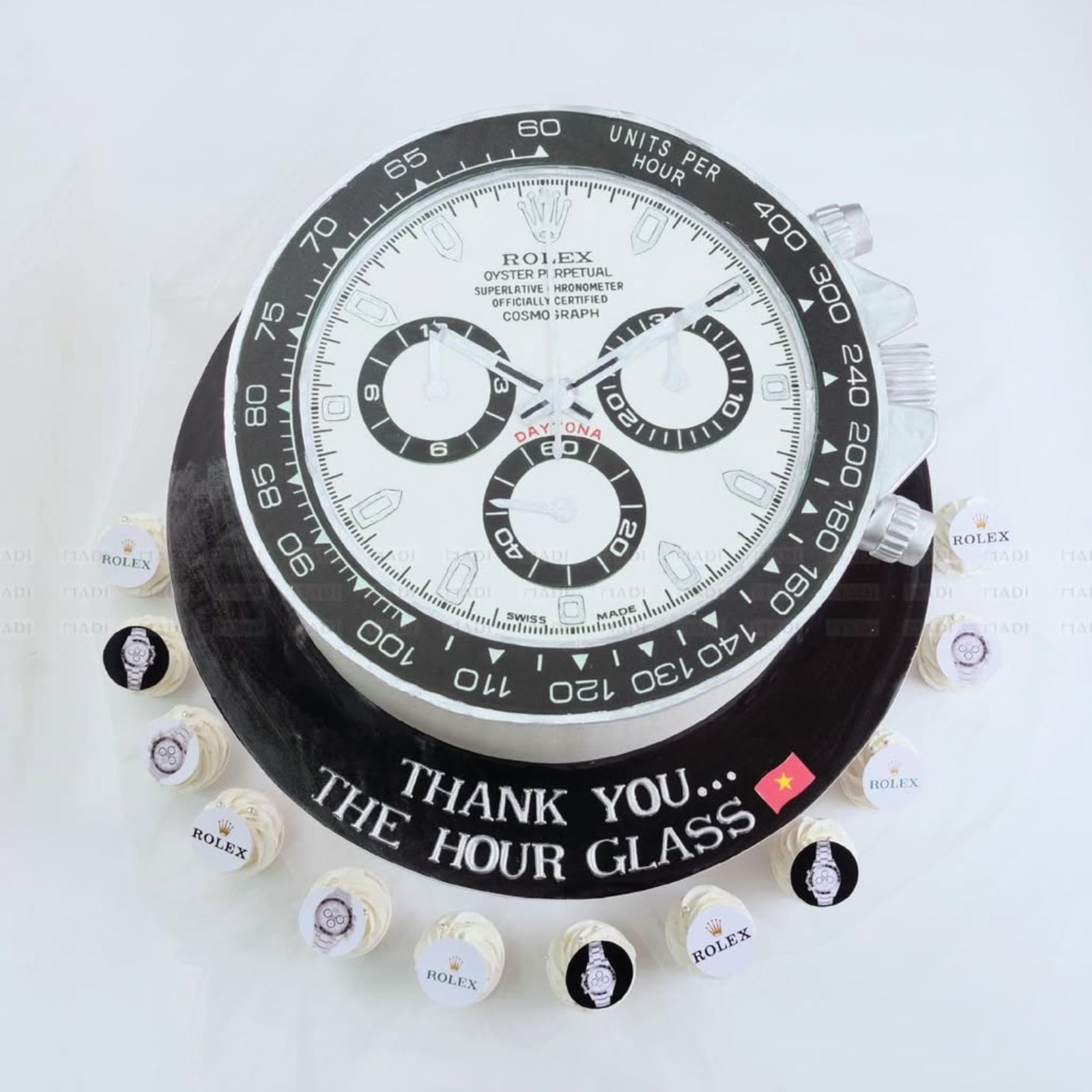 Bánh kem tạo hình đồng hồ Rolex Daytona huyền thoại kết hợp set cupcake đồng bộ sang trọng