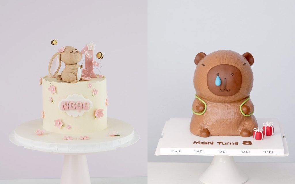 Bánh kem thôi nôi đẹp tối giản, ít chi tiết fondant nên giữ nét lâu khi bày ngoài