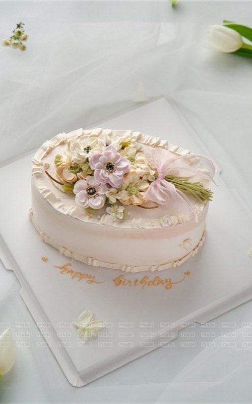 Bánh kem đầy tháng kem sữa tươi size 20cm tại Tiệm Bánh MaDi